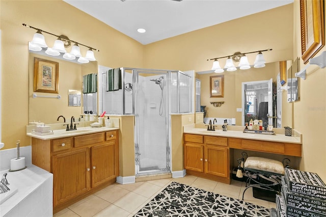 bathroom featuring separate shower and tub, tile patterned flooring, and vanity