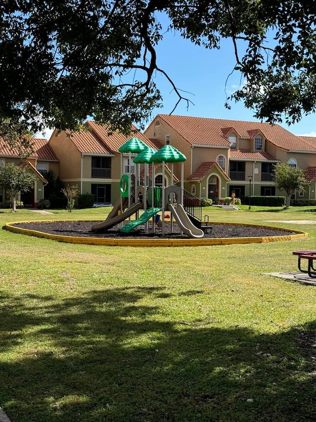 view of jungle gym with a yard