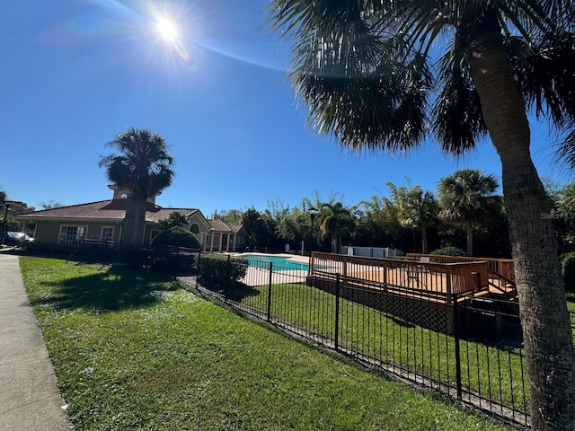 view of yard featuring a pool side deck