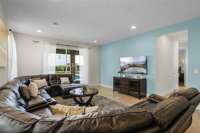 tiled living room with a textured ceiling