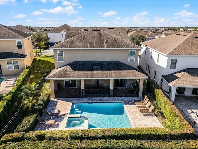 7639 Wilmington Loop, Kissimmee, FL 34747 - rear view of house featuring stucco siding, a residential view, and a patio