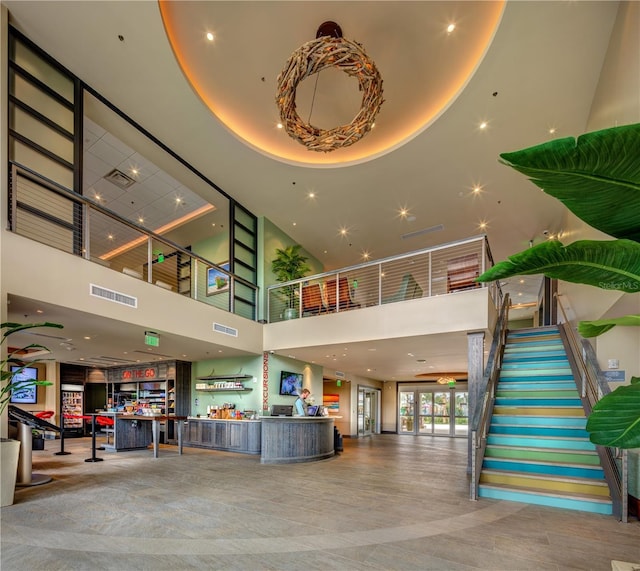 7639 Wilmington Loop, Kissimmee, FL 34747 - lobby featuring a high ceiling and stairway