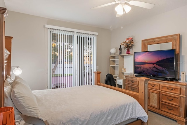 carpeted bedroom featuring ceiling fan and access to exterior