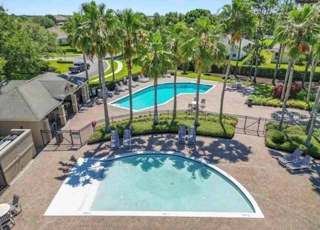 view of swimming pool featuring a patio