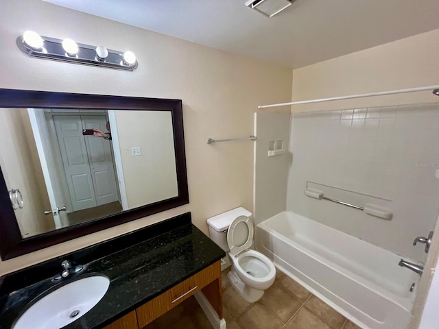 full bathroom with tile patterned floors, shower / washtub combination, vanity, and toilet