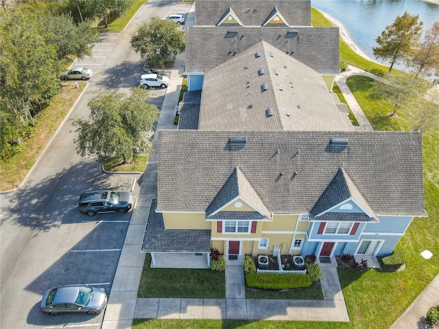 drone / aerial view featuring a water view