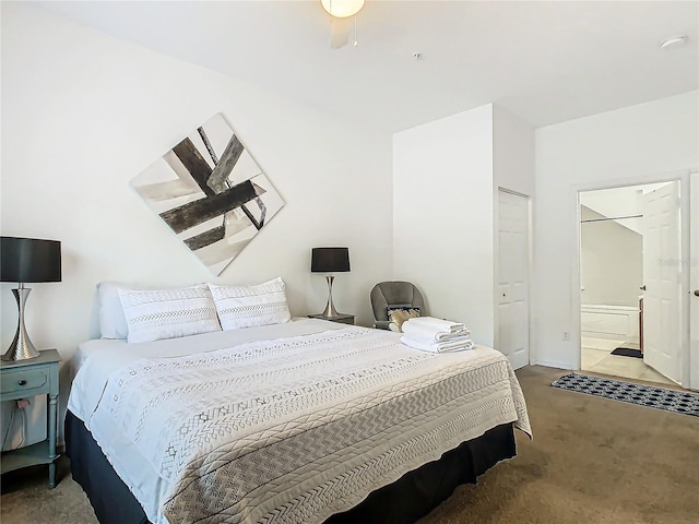 bedroom featuring carpet flooring, ceiling fan, a closet, and ensuite bathroom