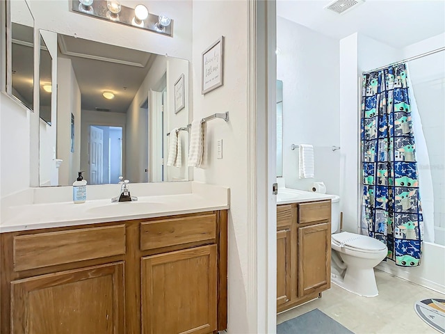 full bathroom featuring vanity, toilet, and shower / bath combo with shower curtain