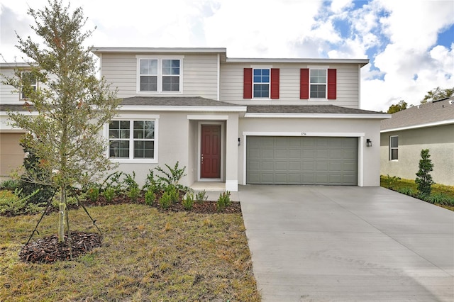 view of front of property featuring a garage