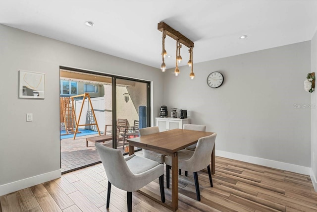 dining room with light hardwood / wood-style floors