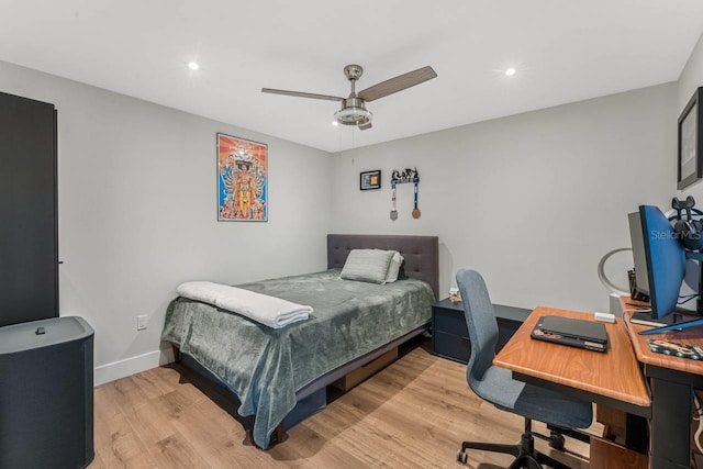 bedroom featuring light wood-type flooring and ceiling fan