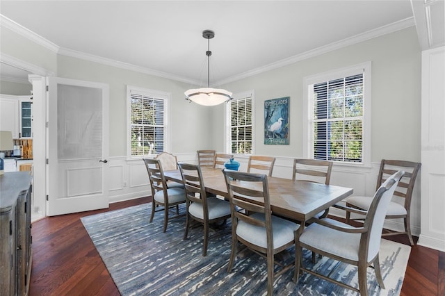 dining area featuring crown molding and dark hardwood / wood-style floors