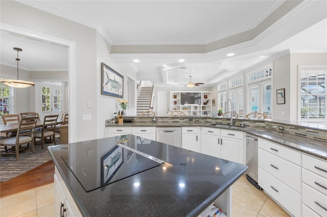 kitchen with light hardwood / wood-style flooring, ceiling fan, ornamental molding, and sink