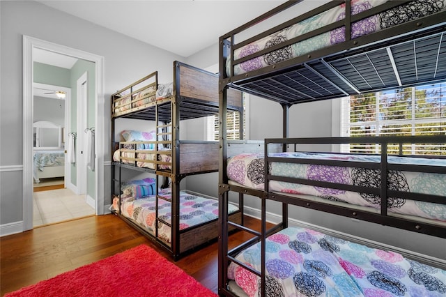 bedroom with hardwood / wood-style floors