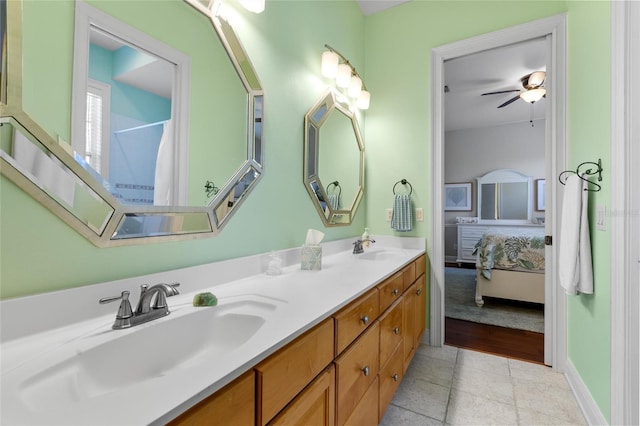 bathroom with vanity, tile patterned floors, and ceiling fan