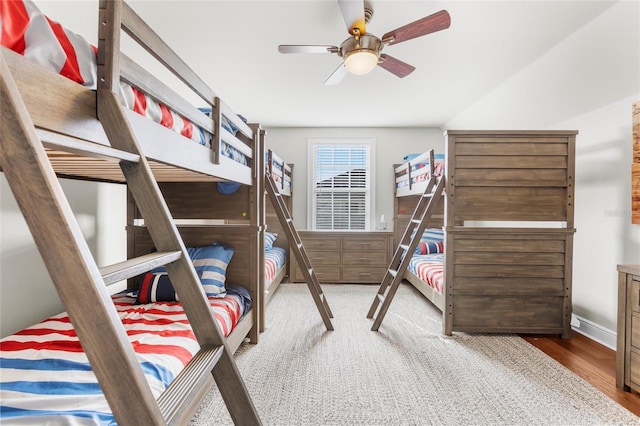 bedroom featuring hardwood / wood-style flooring and ceiling fan