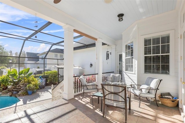 view of patio / terrace with a lanai