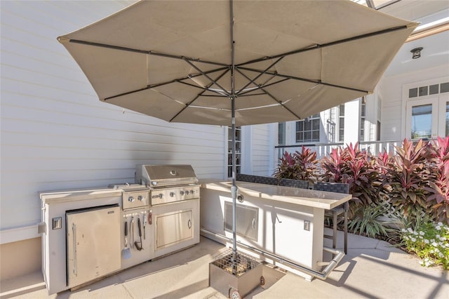 view of patio with a grill and exterior kitchen