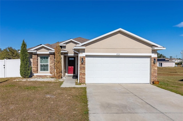 ranch-style home with a front yard and a garage