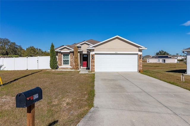 825 Desmoines Pl, Kissimmee, FL 34759 - ranch-style house featuring a garage and driveway
