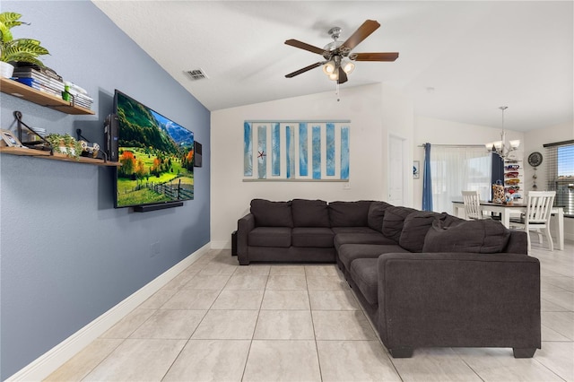 living room featuring light tile patterned floors, ceiling fan with notable chandelier, and vaulted ceiling