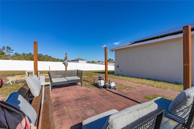 825 Desmoines Pl, Kissimmee, FL 34759 - fenced backyard with a patio