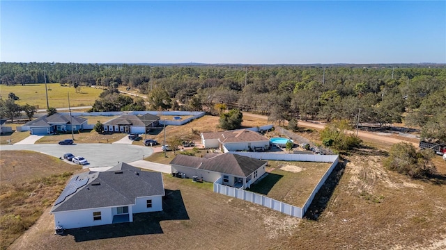 825 Desmoines Pl, Kissimmee, FL 34759 - view of subject property with a forest