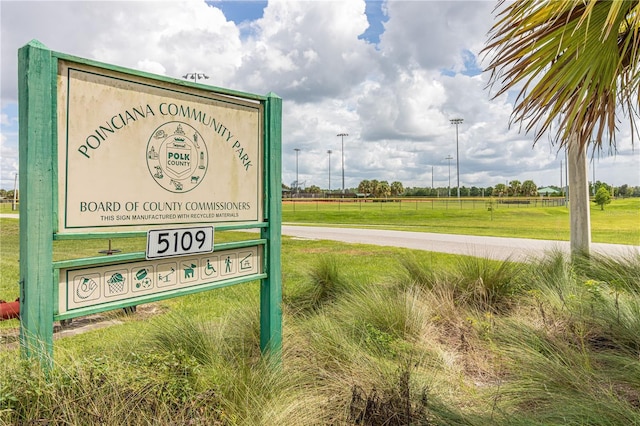 825 Desmoines Pl, Kissimmee, FL 34759 - community sign with a yard