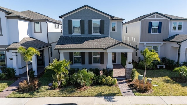 front facade with a front lawn