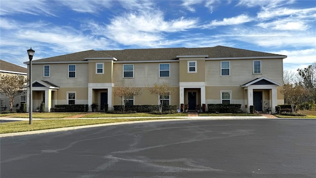 view of front of house with a front lawn