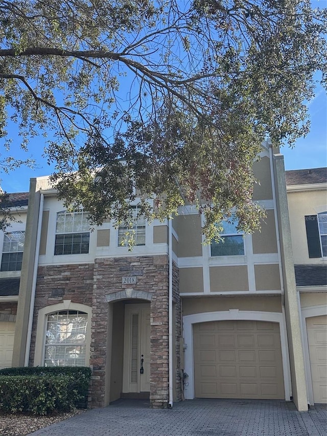 view of property featuring a garage