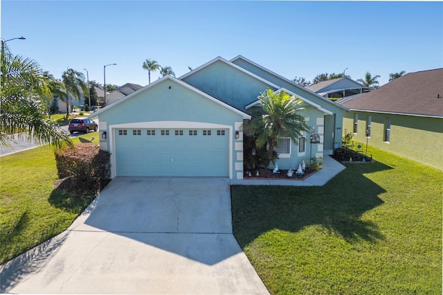 view of front of property featuring a garage and a front lawn