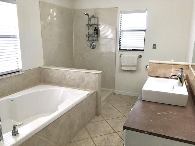 bathroom featuring separate shower and tub, tile patterned flooring, and vanity