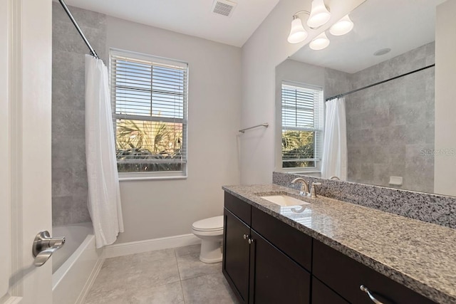 full bathroom featuring vanity, shower / tub combo with curtain, tile patterned flooring, a chandelier, and toilet