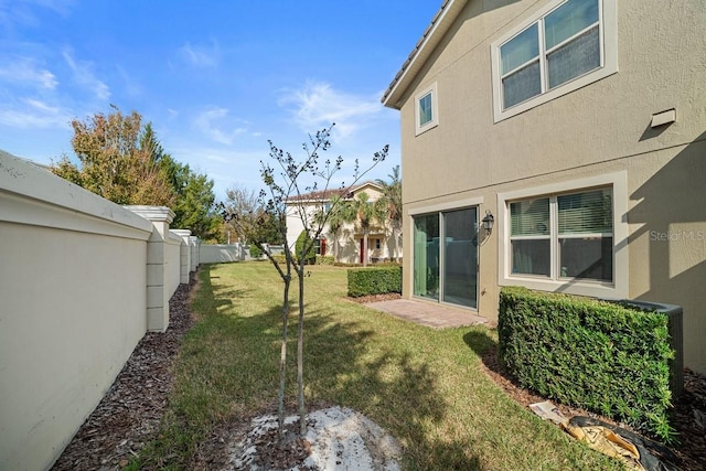 view of yard with a fenced backyard