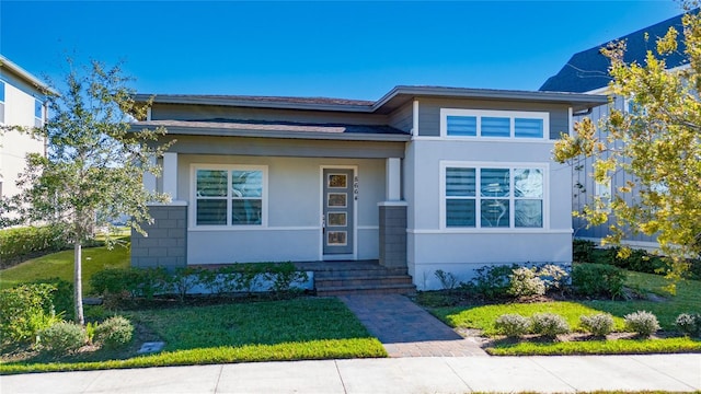 view of front facade with a front lawn