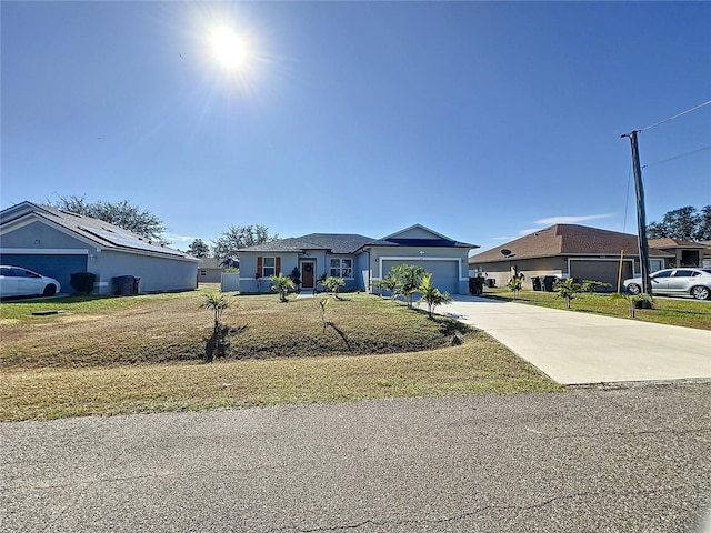 single story home with a front yard and a garage