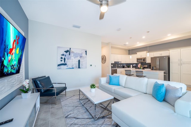 living room with ceiling fan