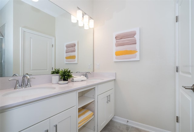 bathroom with tile patterned floors and vanity