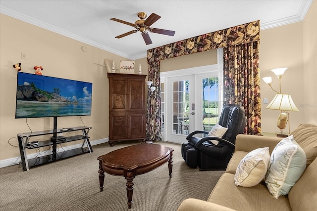 carpeted living room featuring ceiling fan, crown molding, and french doors