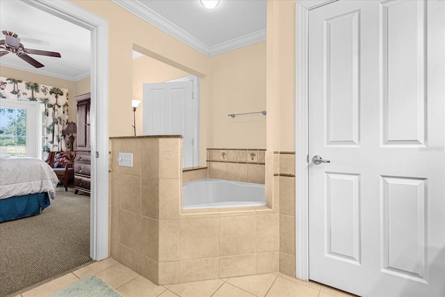 bathroom featuring tile patterned floors, ceiling fan, crown molding, and a relaxing tiled tub