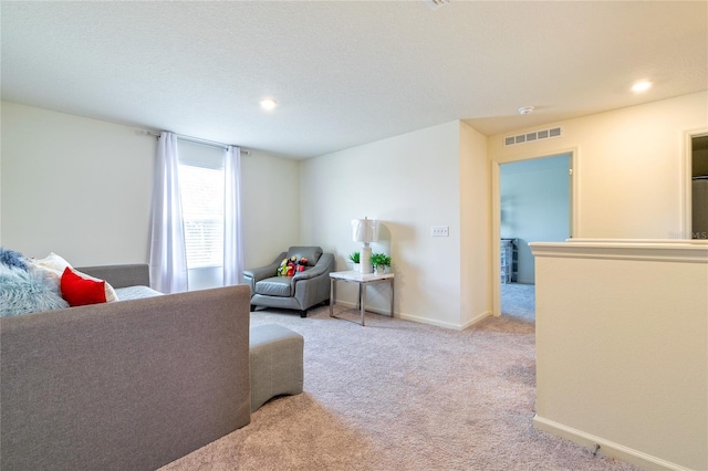 living room with light colored carpet