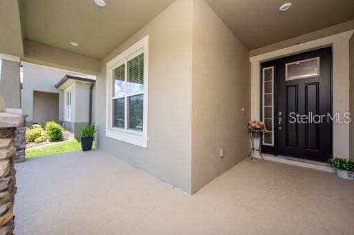 property entrance with a porch