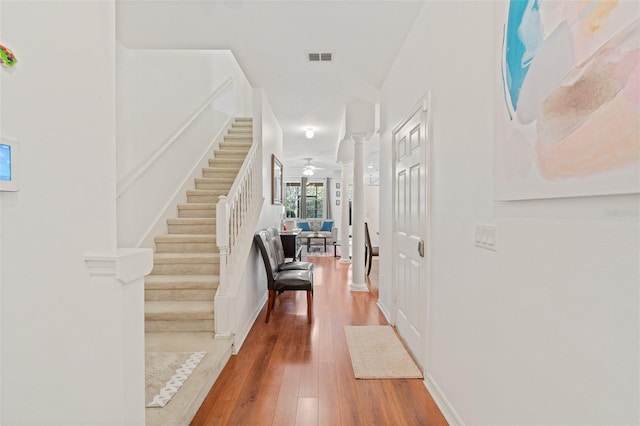 hallway featuring hardwood / wood-style flooring