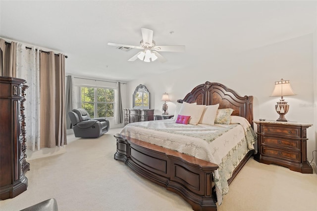 bedroom featuring ceiling fan and carpet floors