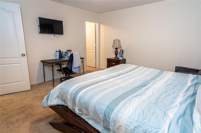 bedroom featuring light colored carpet