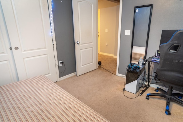 bedroom with light carpet