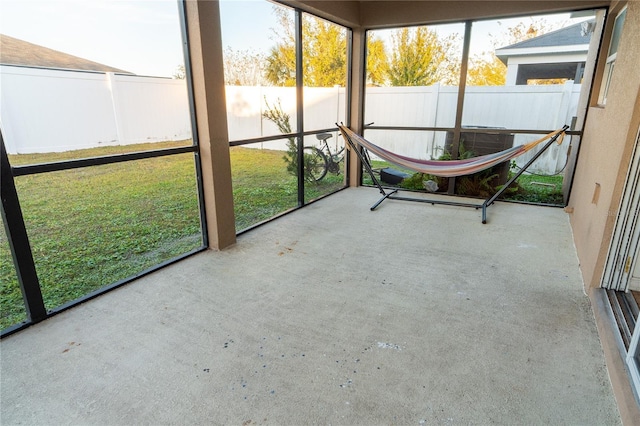 unfurnished sunroom with a healthy amount of sunlight