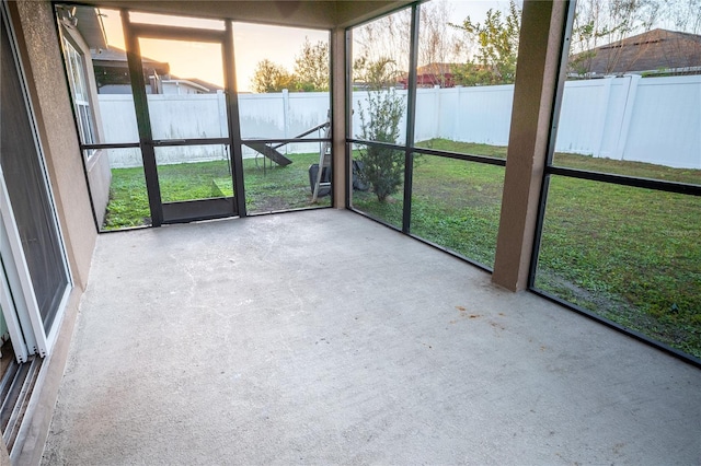 unfurnished sunroom with a wealth of natural light