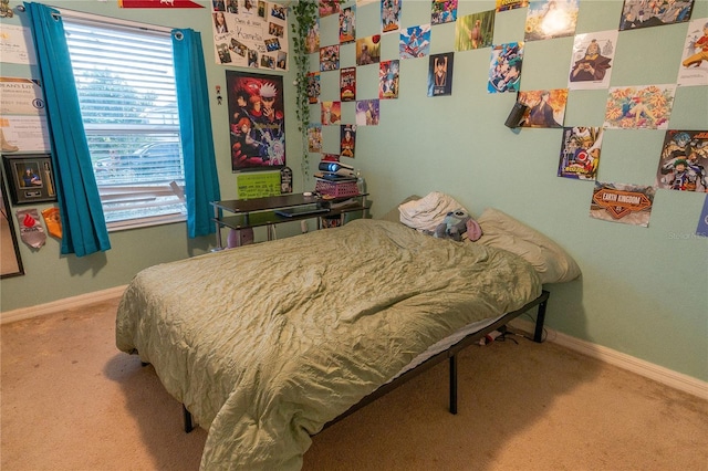 bedroom featuring carpet